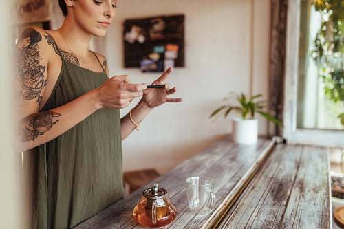 Woman taking photos for her blog