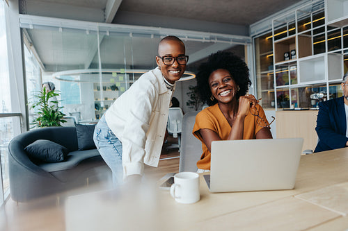 Black women in a successful business meeting at a creative startup office