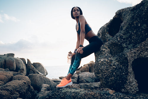 Female relaxing after exercising outdoors