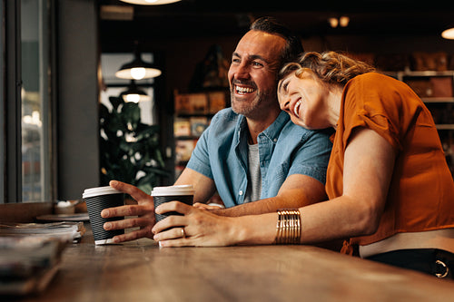 Smiling couple at coffee shop