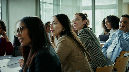 Professionals listening at a business meeting