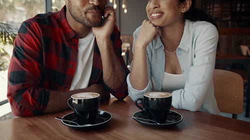 Beautiful couple spending quality time at a cafe