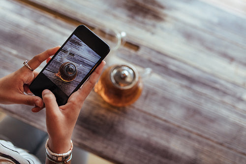 Woman taking photos for her blog