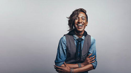 Smiling african man in fashionable hairstyle