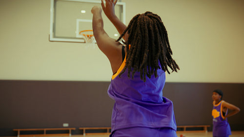 Basketball team celebrates winning shot