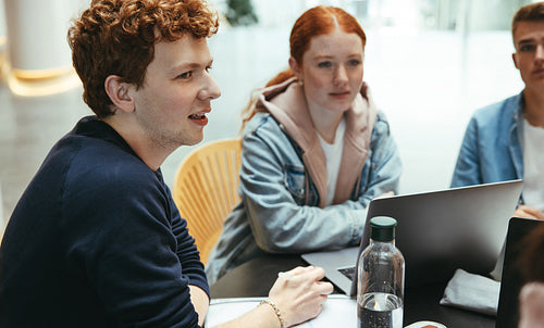 Students studying together at college campus