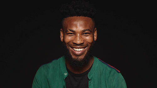 Close up of a laughing african male