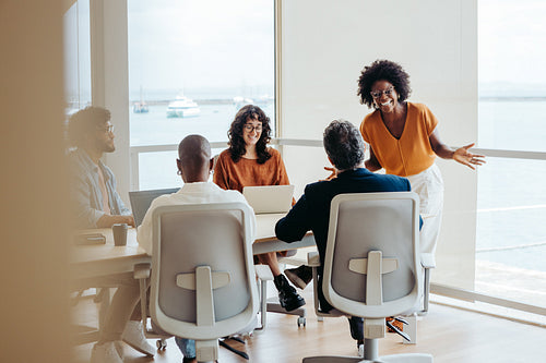 Diverse group of professionals collaborating in a productive business meeting