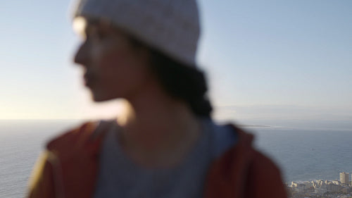 Smiling girl standing outdoors on winter day