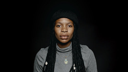 Happy african female with long dreadlocks