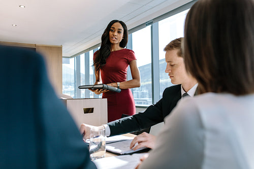Office workers discussing new business strategy