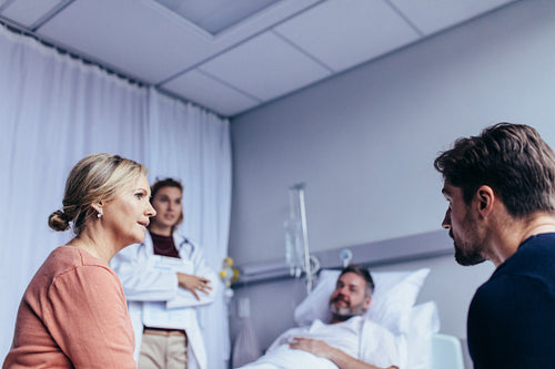 Family visiting hospitalised man