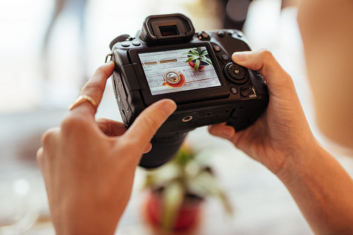 Woman taking photos for her food blog