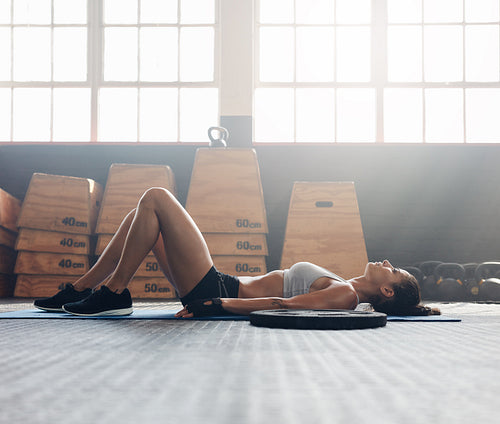 Fitness woman taking break after workout