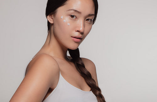 Woman having facial treatment