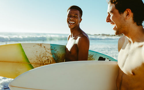 Happy young friends on vacation at the sea