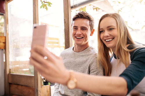 Happy couple making a selfie
