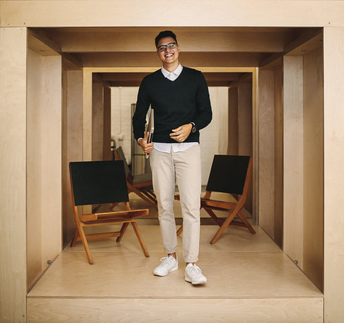 Portrait of a businessman standing in office