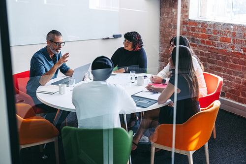 Businesspeople having a discussion in a meeting room