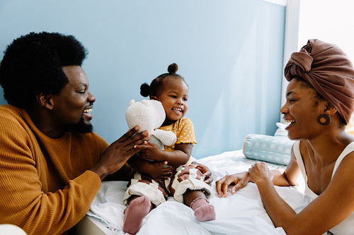 Family moment with parents and child at home