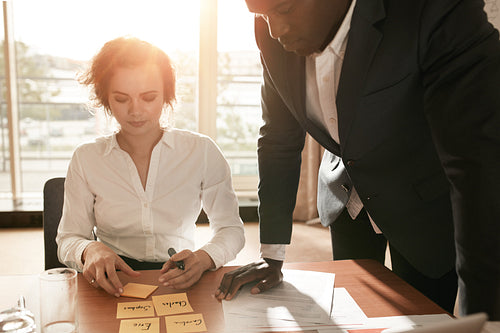 Business colleagues in conference room discussing working plan
