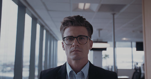 Confident mature businessman in office