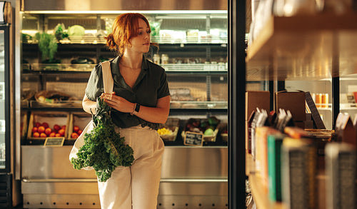 Female customer buying groceries in a supermarket