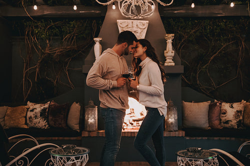 Newly wedded couple kissing while on honeymoon