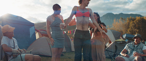 Festival fun and candid friends camping together