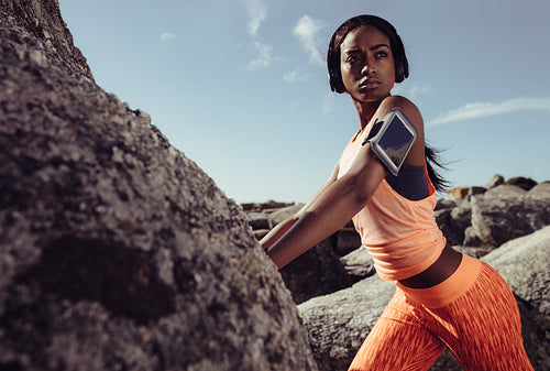 Fitness woman during training session outdoors.