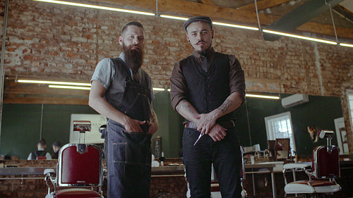 Two professional hairstylist in salon