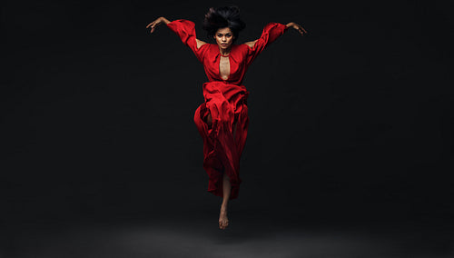 Beautiful woman dancing in studio