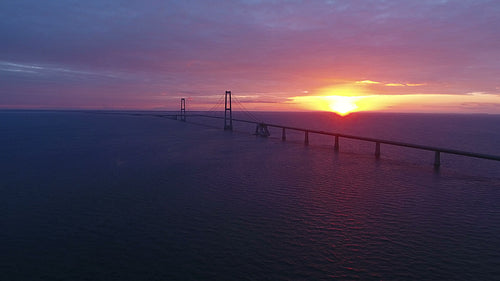 Storebaelt bridge over sea at sunset