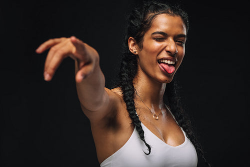 Portrait of fit woman in playful mood