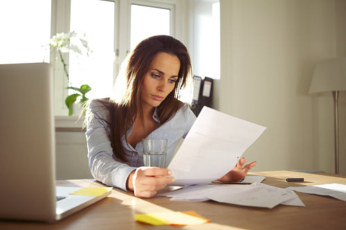 Businesswoman reading a document