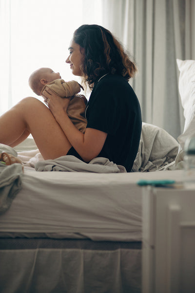 Mother bonding with infant child