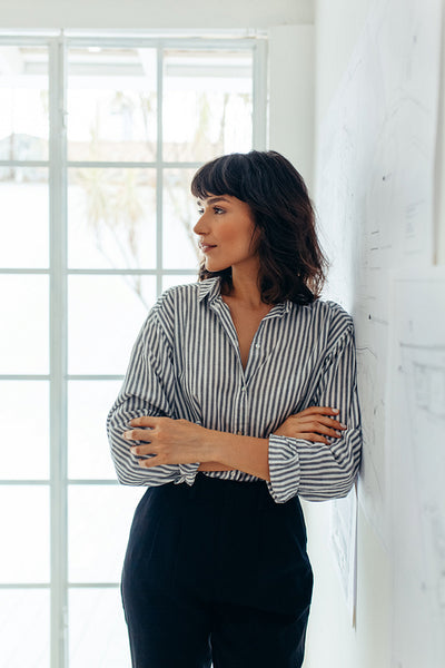 Portrait of businesswoman standing in office