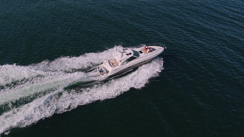 Drone shot of yacht sailing in the ocean
