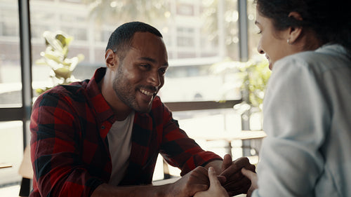 Beautiful couple on a date at cafe