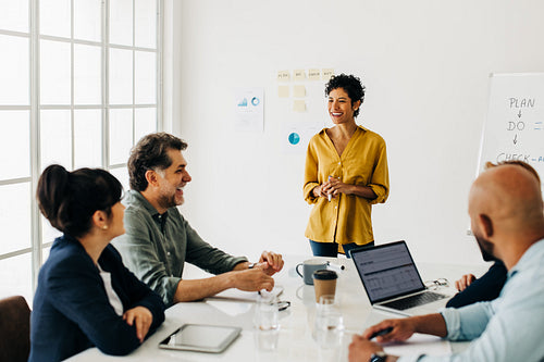 Diverse business people talking in a meeting. Business team having a discussion in a boardroom