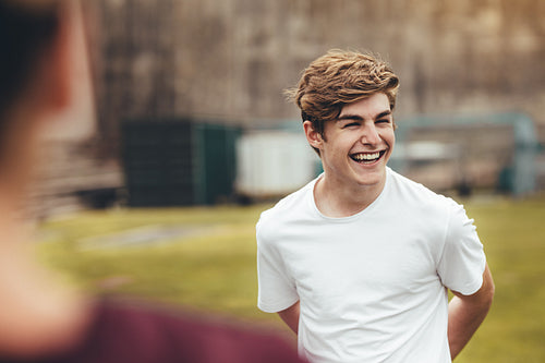 Boy smiling during physical training class in high school