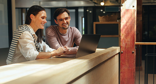 Business professionals joining an online conference in a coworking office