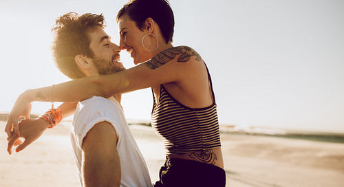 Couple in love flirting outdoors