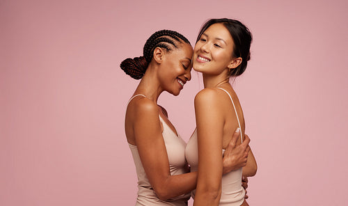 Two mixed race women in underwear