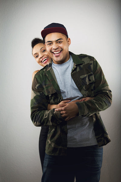 Laughing cheerful young couple together