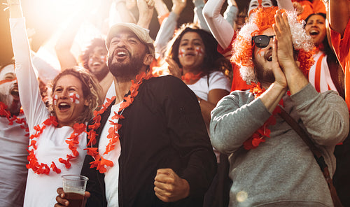English football fans celebrating a championship win