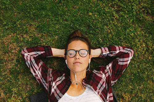Female student relaxing at campus