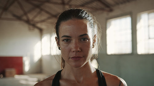 Portrait of fit woman in the gym after training session