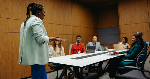 Diverse team in dynamic business meeting presentation