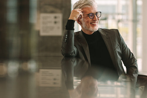 Senior business man relaxing at cafe